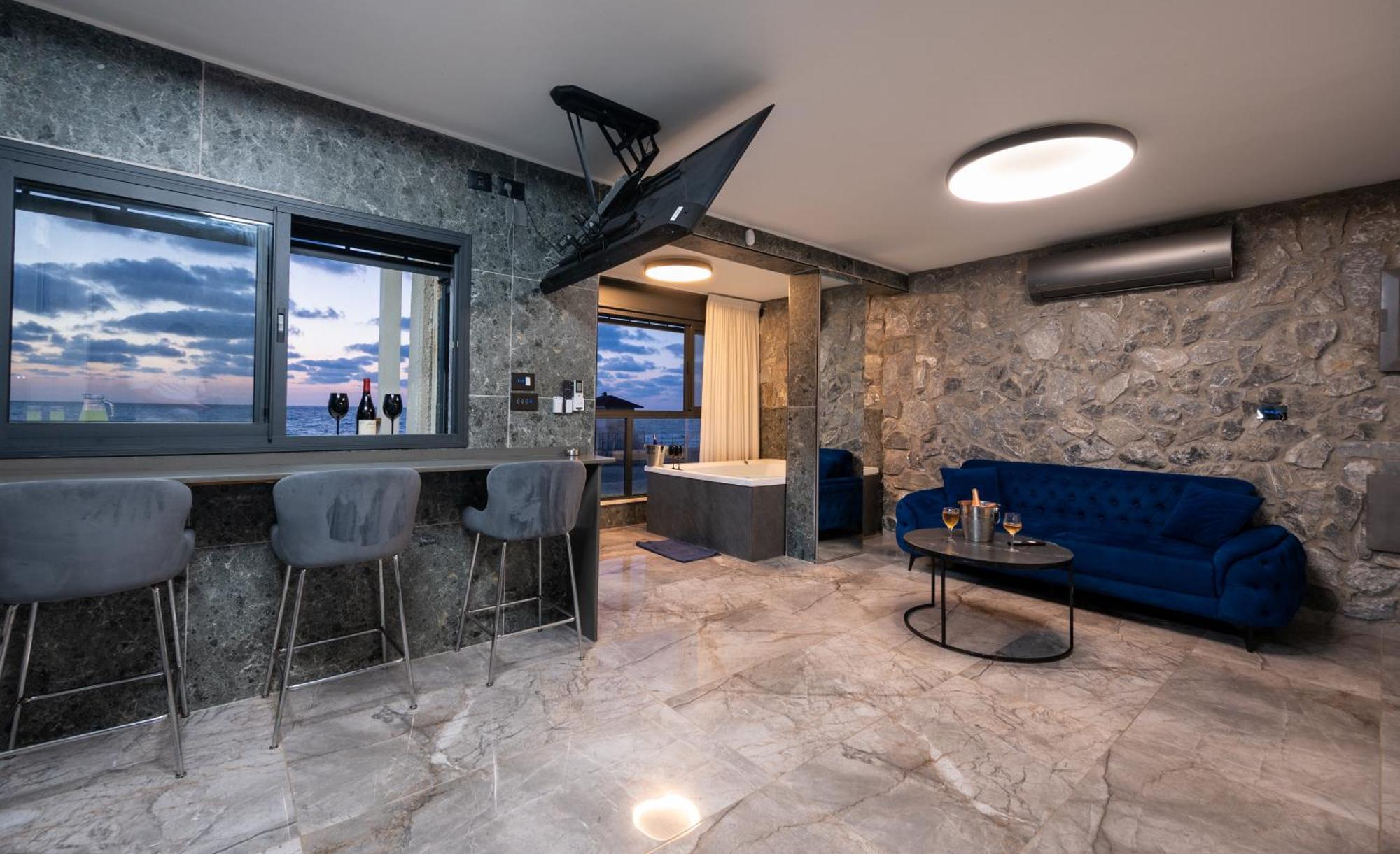 מבנים בים 77 Suites At Sea Haifa Exterior foto
